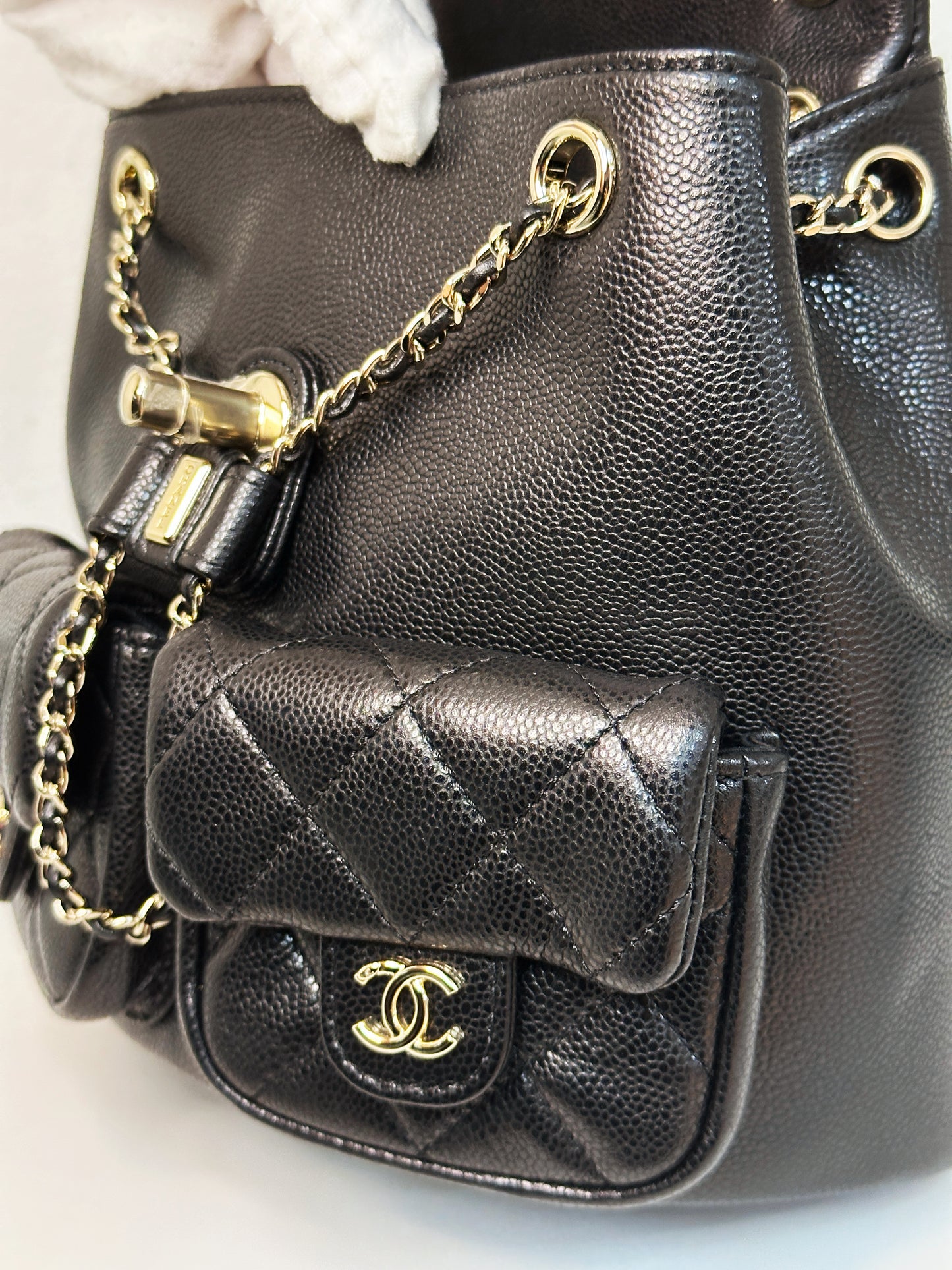 Chanel 23P Small Shiny Caviar Quilted Duma Pockets Drawstring Backpack Black LGHW microchip AP53