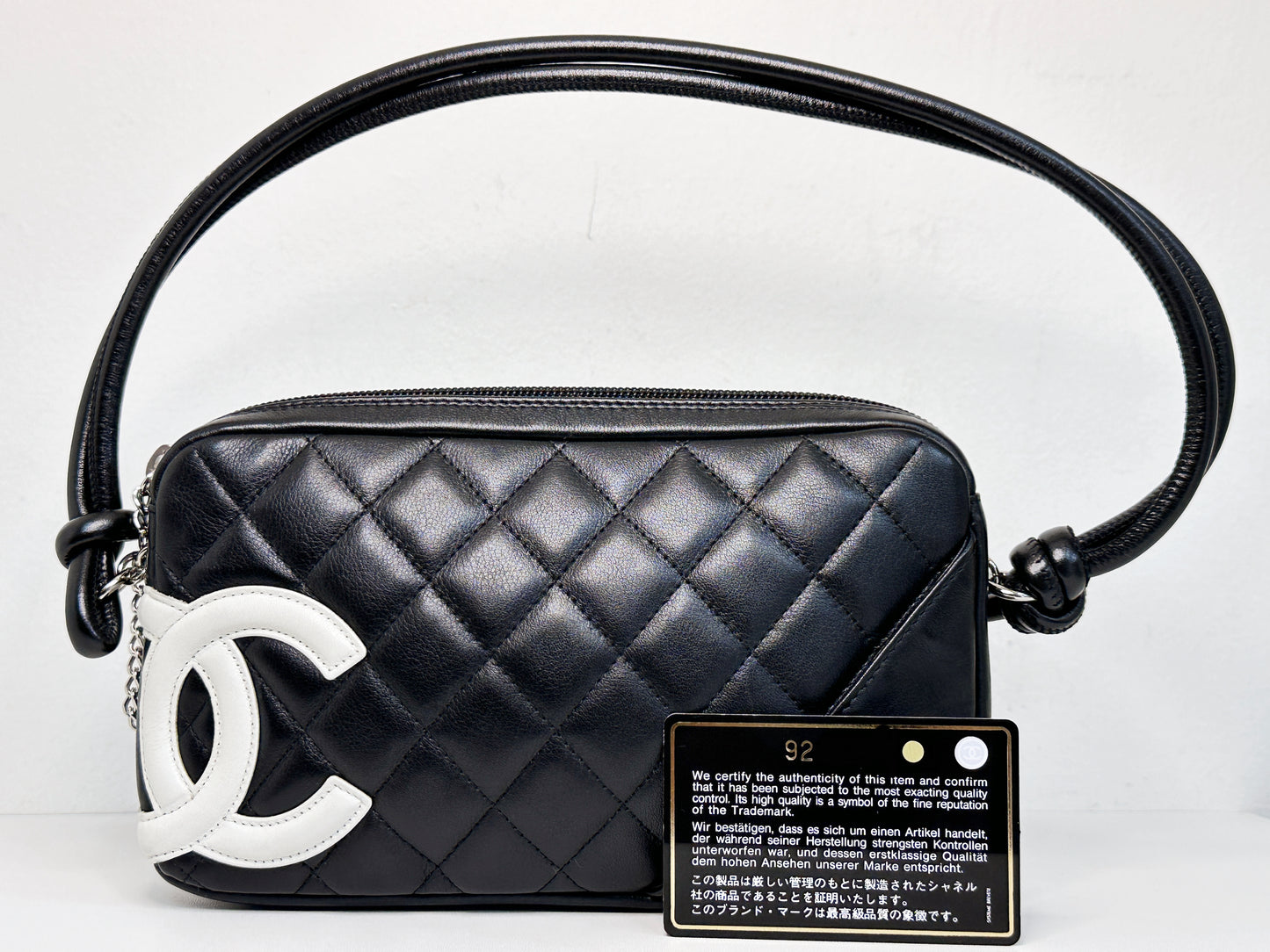 Chanel Calfskin Quilted Cambon Pochette Black White 92 holo card