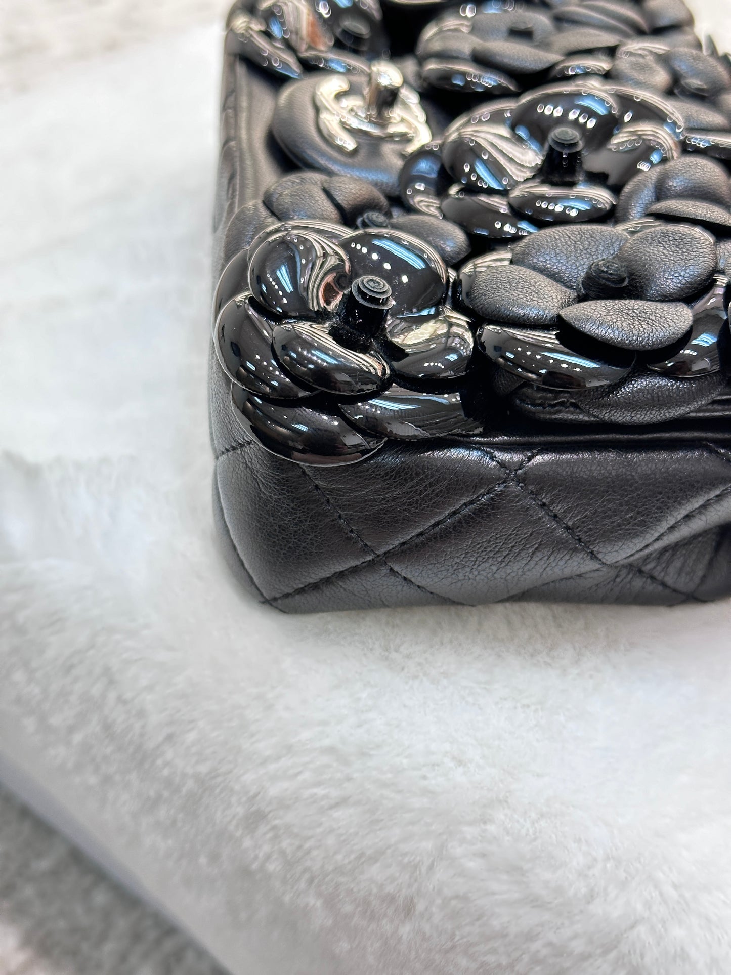 Chanel Limited Edition Black Camellia Mini Flap Bag.