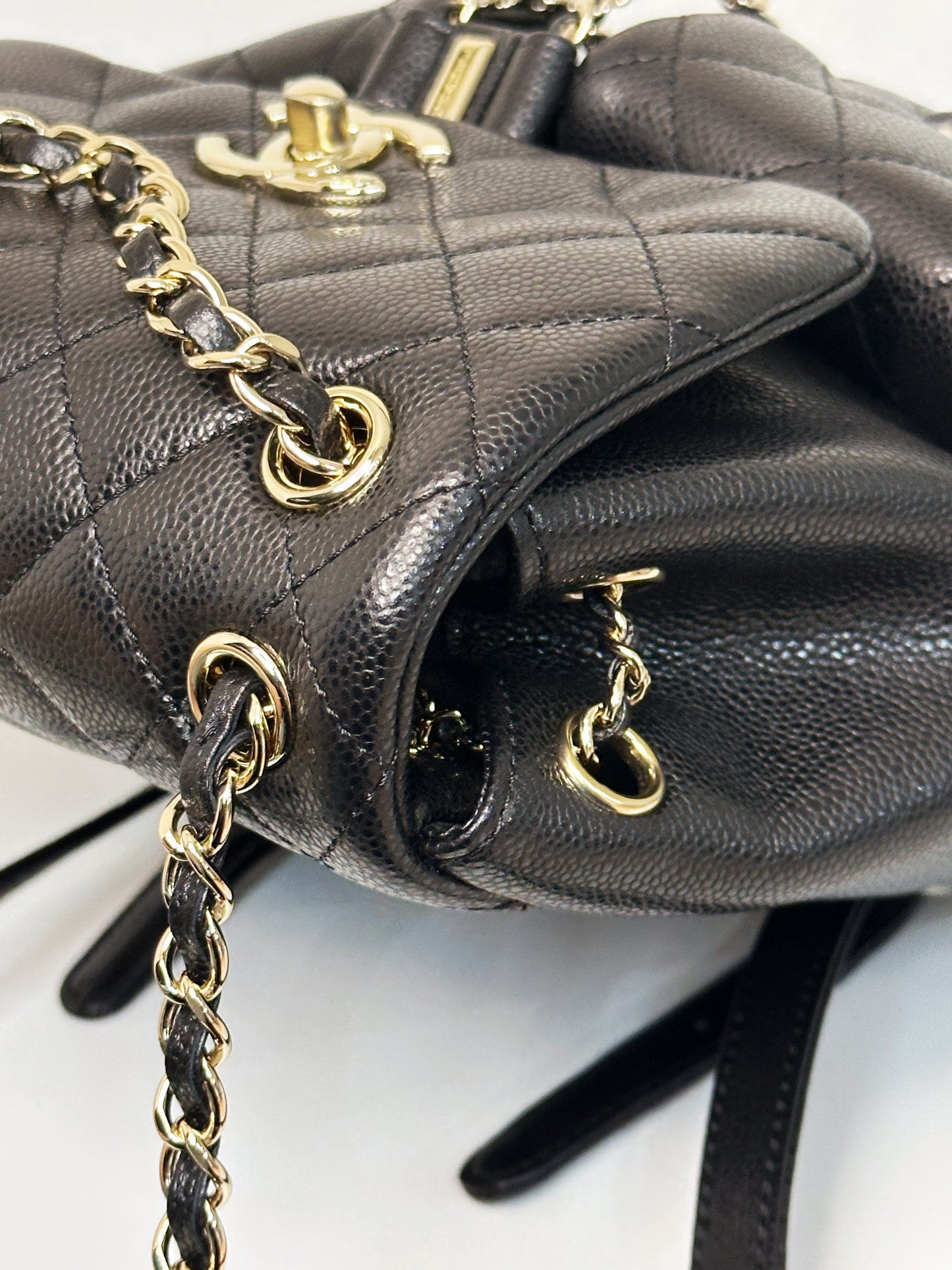 Chanel 23P Small Shiny Caviar Quilted Duma Pockets Drawstring Backpack Black LGHW microchip AP53