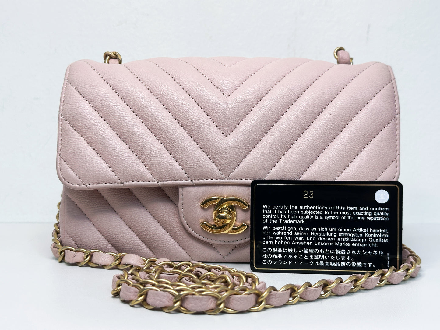 Chanel Classic Mini Rectangular 17C Light Pink Chevron Calfskin with brushed gold hardware 2383 holo card