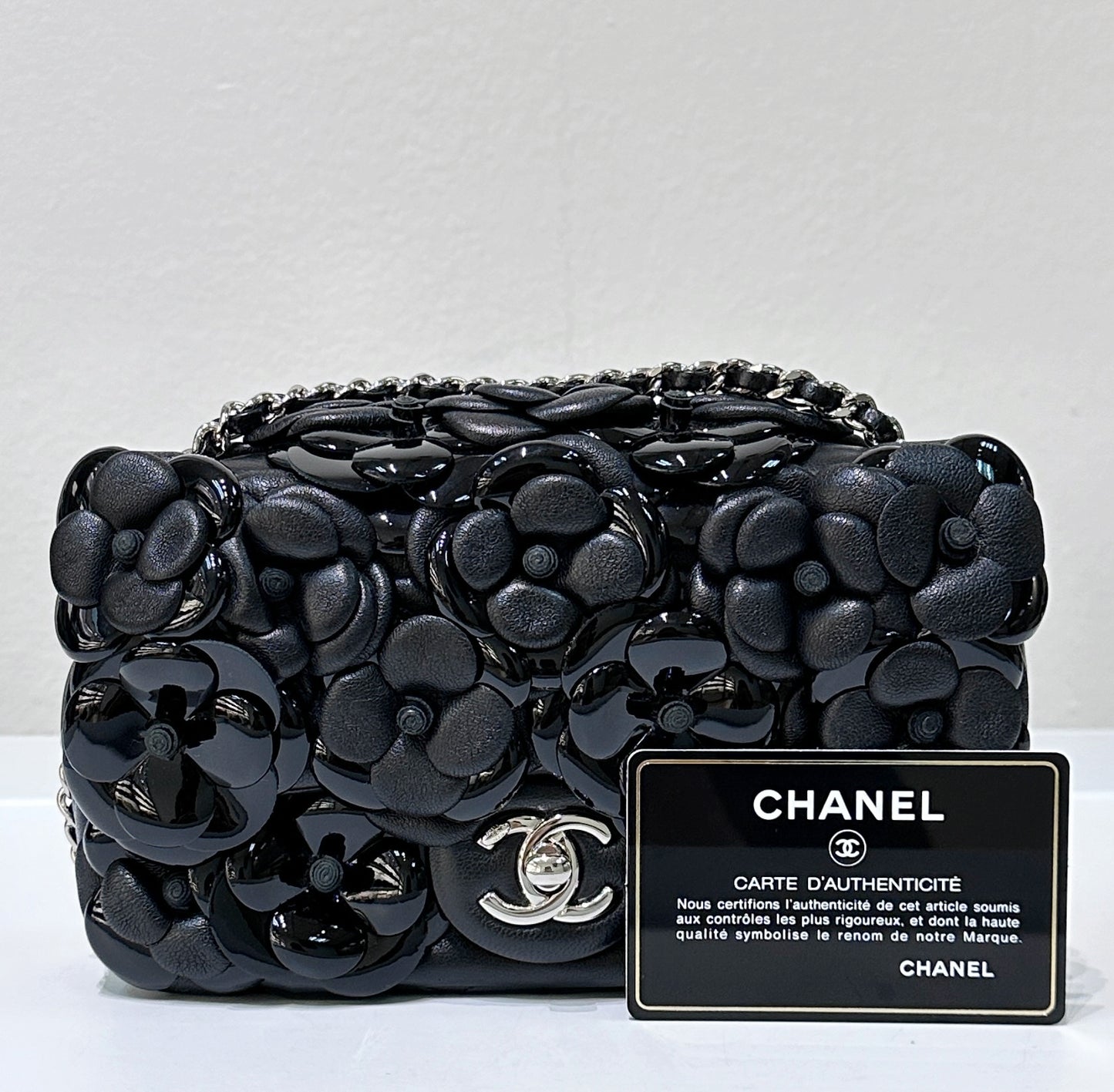 Chanel Limited Edition Black Camellia Mini Flap Bag.