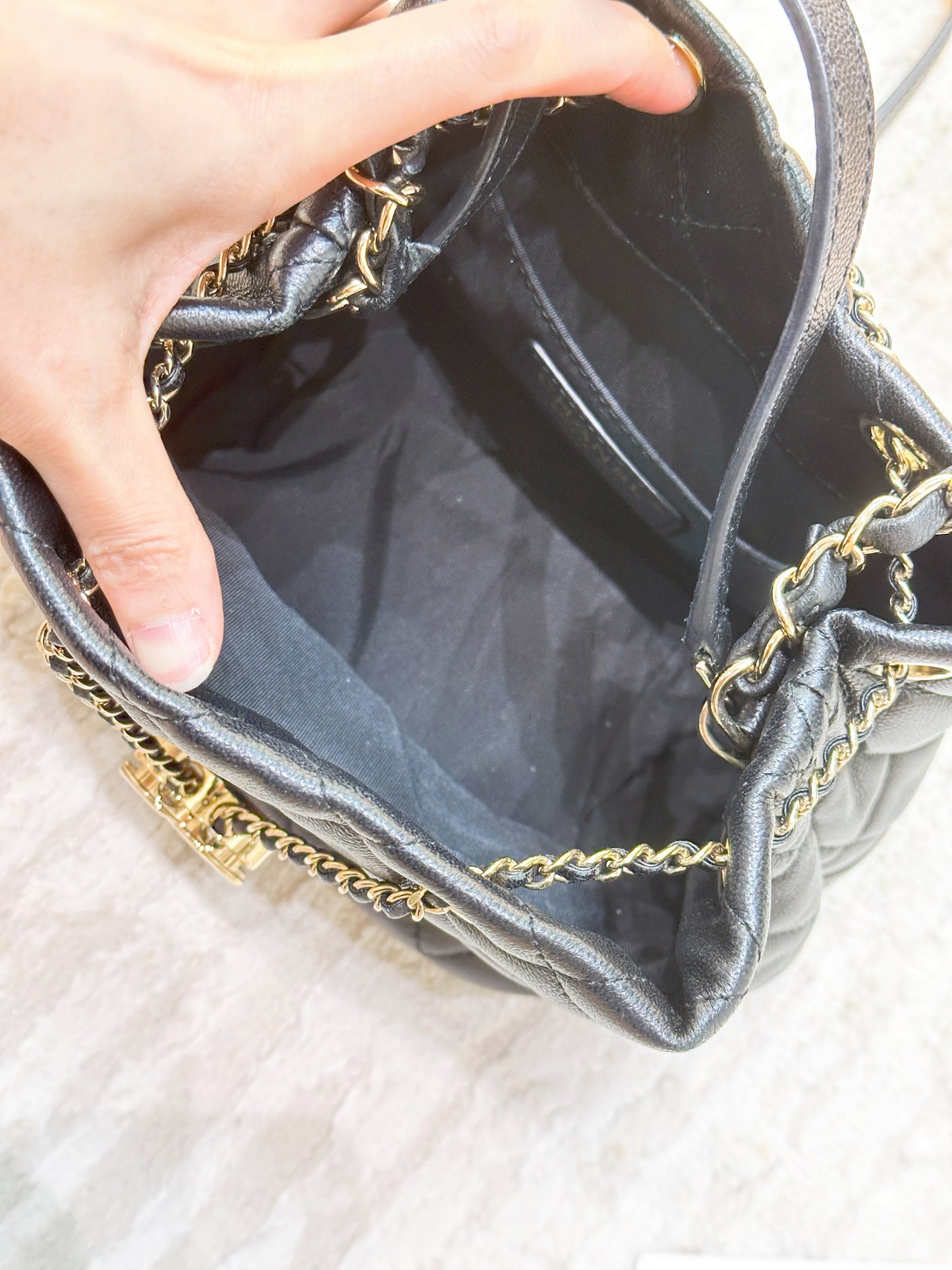CHANEL Caviar Quilted Rolled Up Bucket Drawstring Bag Black