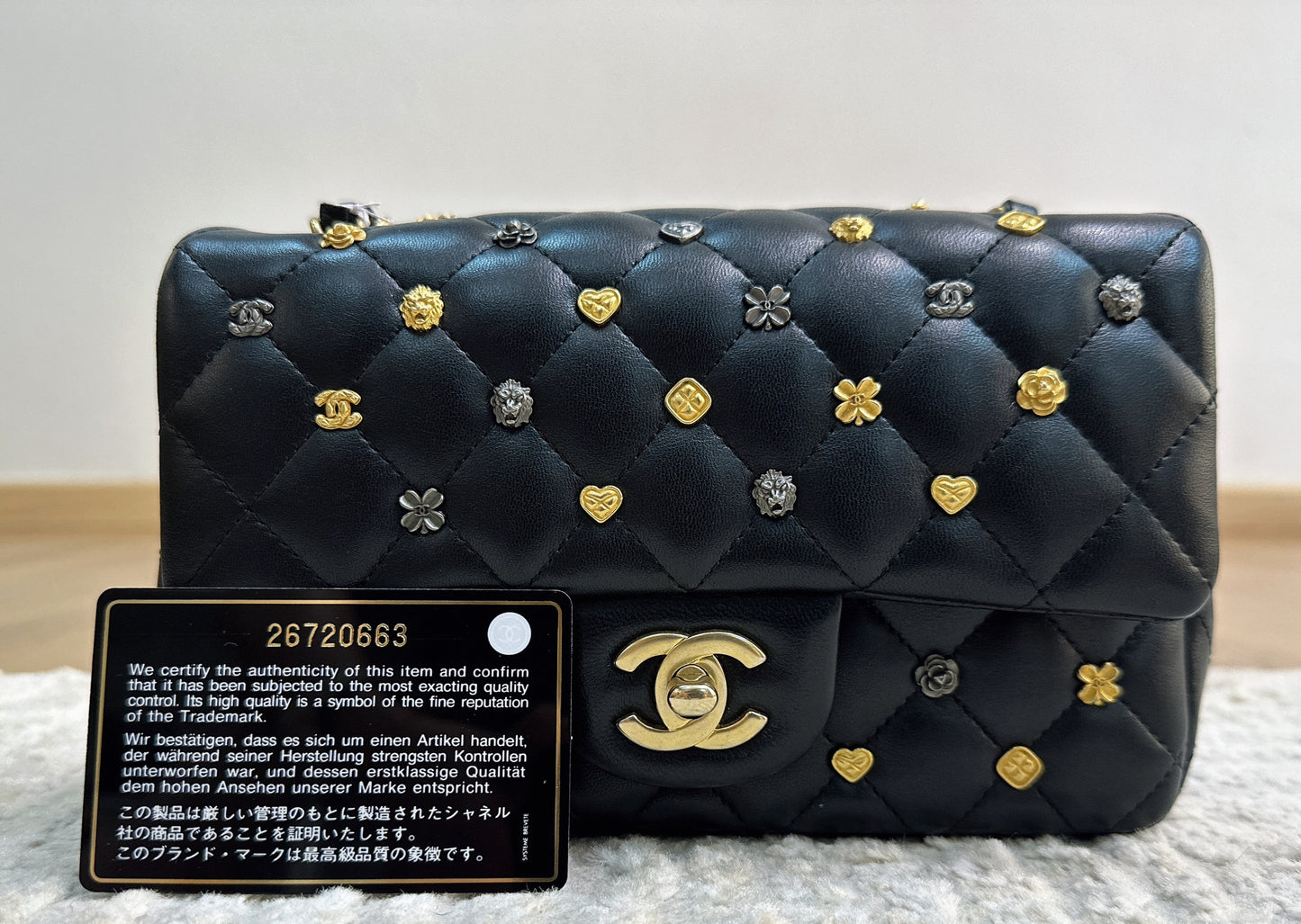 CHANEL Lambskin Quilted Studded Mini Rectangular Flap Black