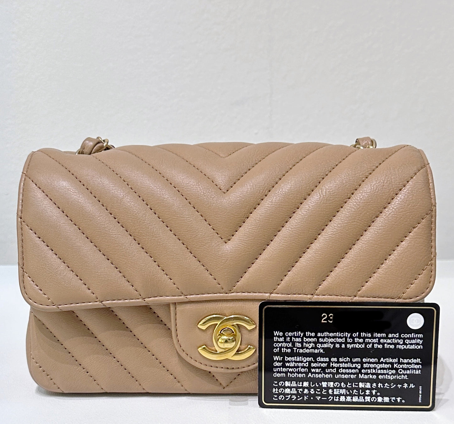 Chanel Mini Rectangular Calfskin Chevron Quilted Flap Dark Beige