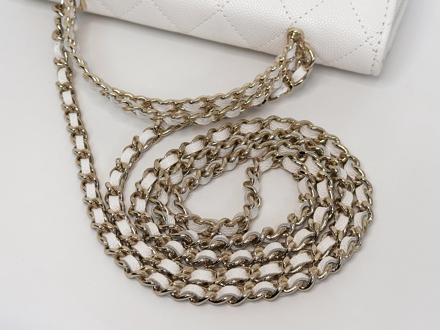 Chanel 23P Top Handle Kelly Clutch with Chain in White Caviar GHW