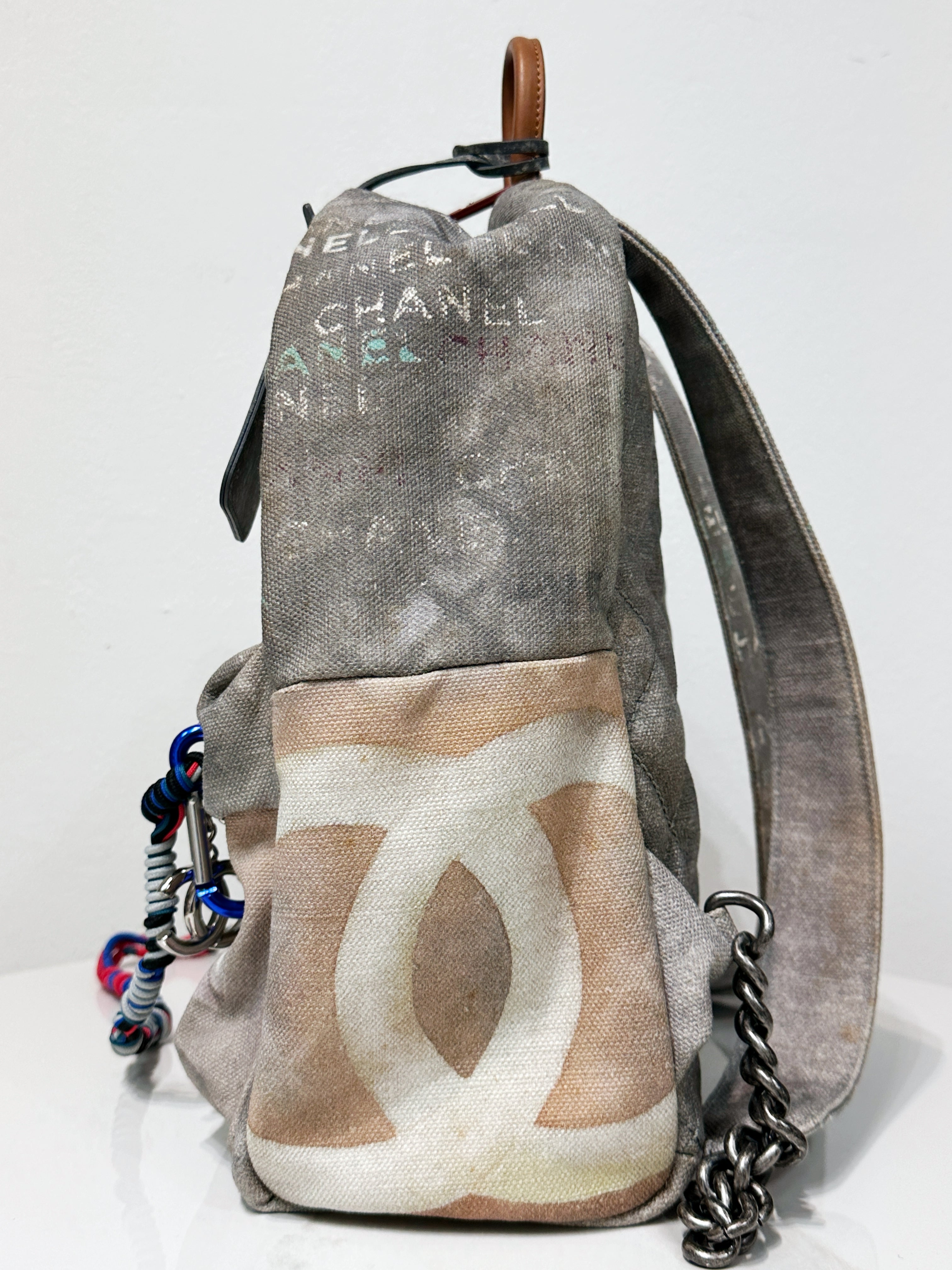 Preloved authentic Chanel Graffiti Printed Canvas Medium Backpack Grey