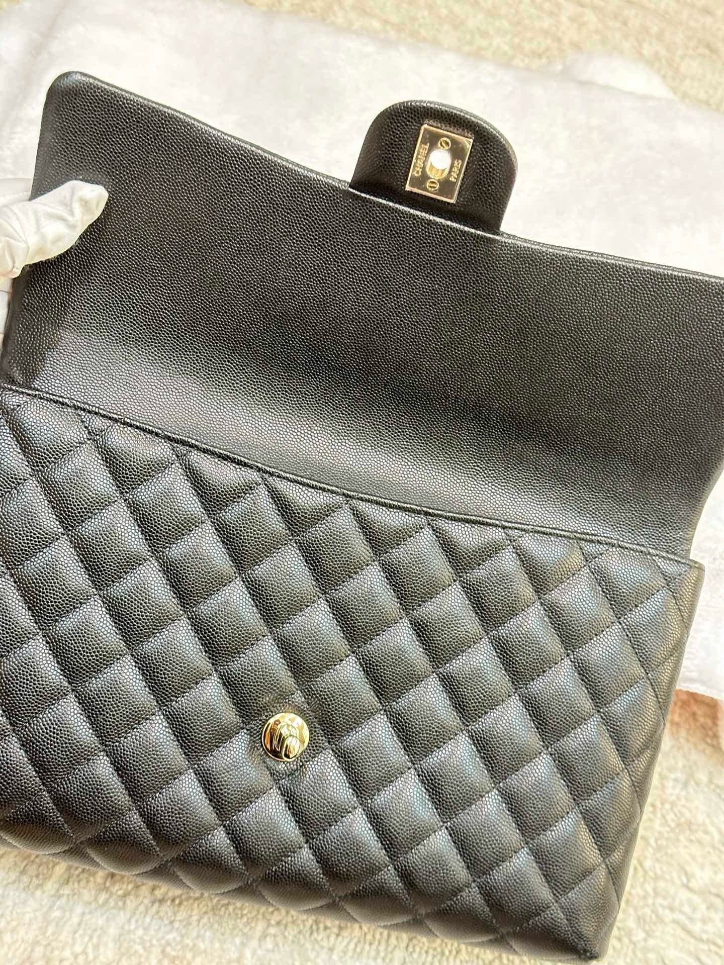 Chanel Quilted Caviar Classic Clutch Black GHW