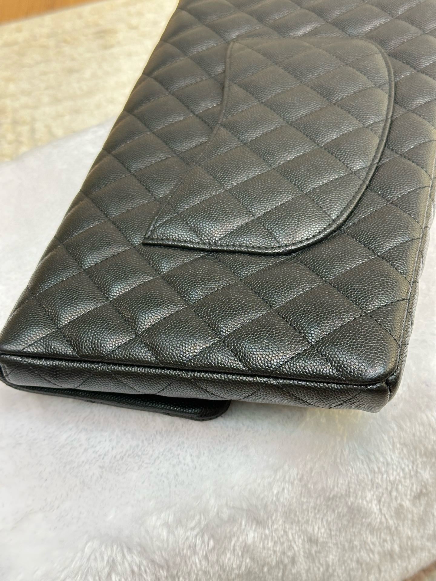 Chanel Quilted Caviar Classic Clutch Black GHW