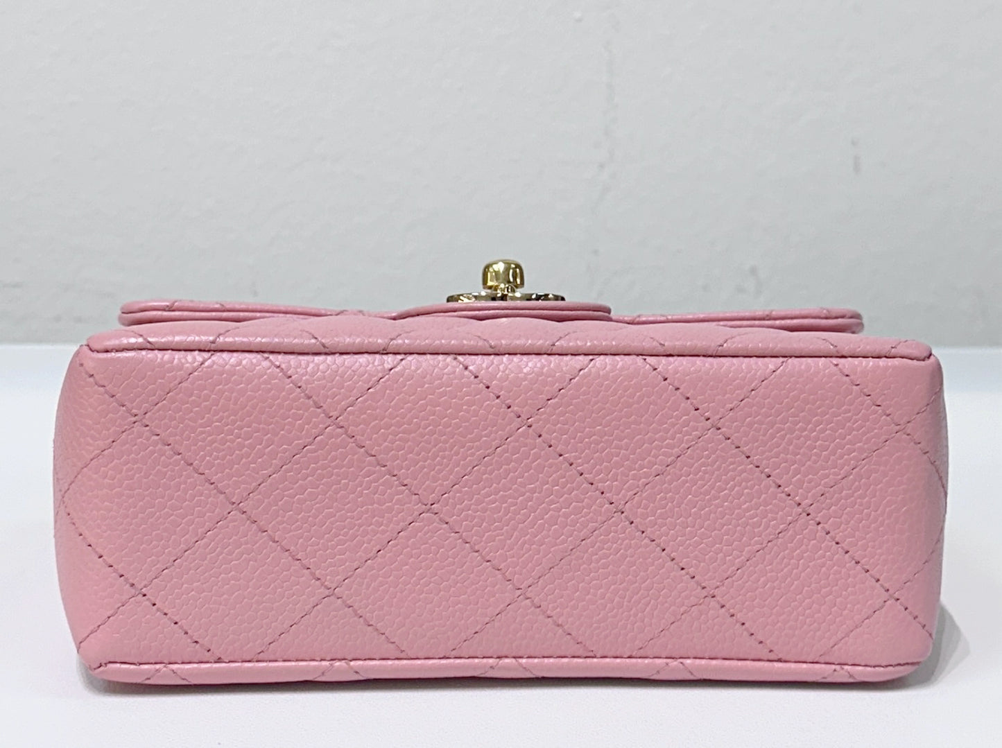 Chanel Mini Square Classic Caviar Flap Pink. Body lightly touched