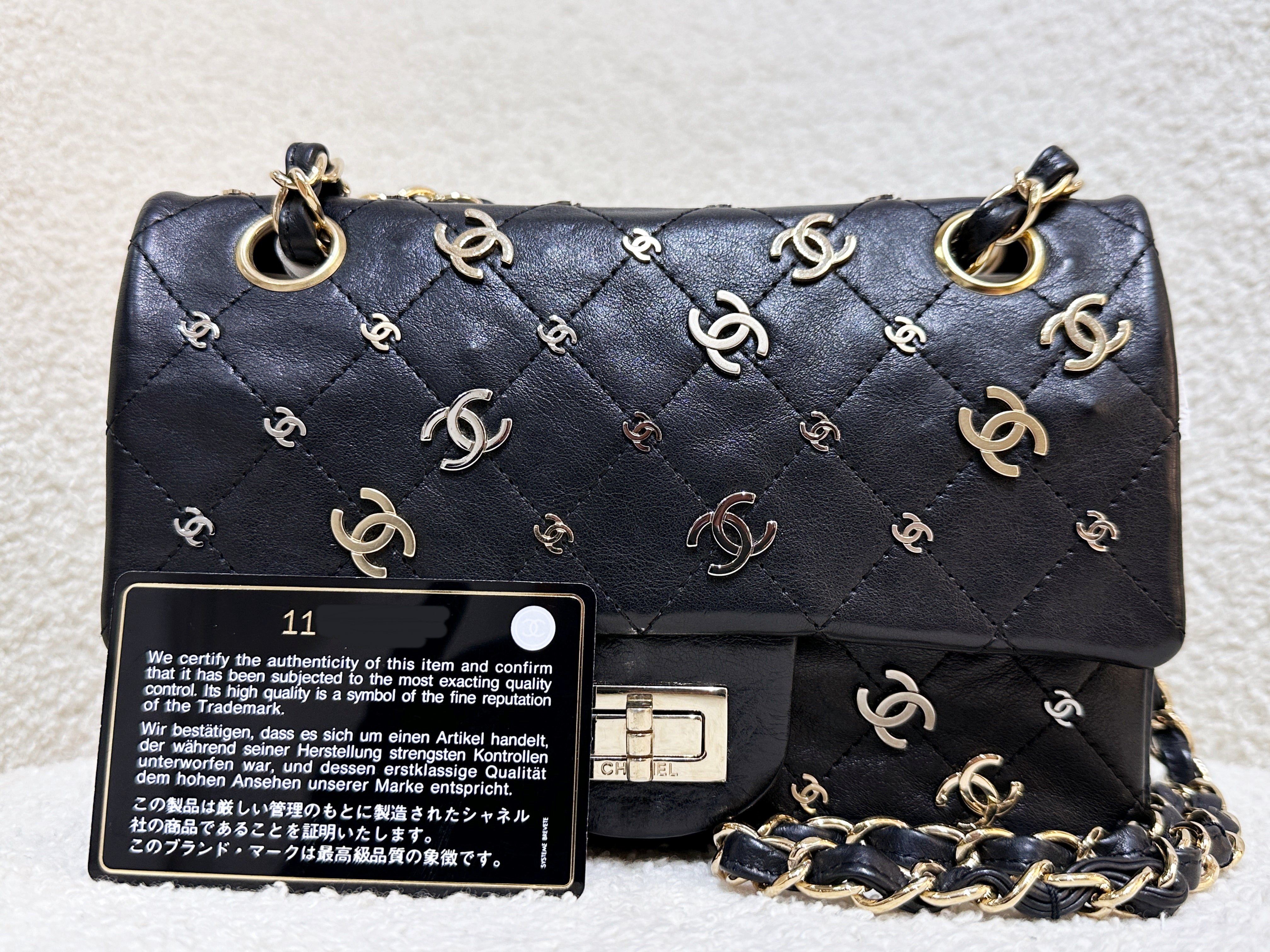 Preloved Authentic 
ChanelBlack Quilted Calfskin 2.55 Reissue 224 Punk CC Charm Flap Gold Hardware, 2007