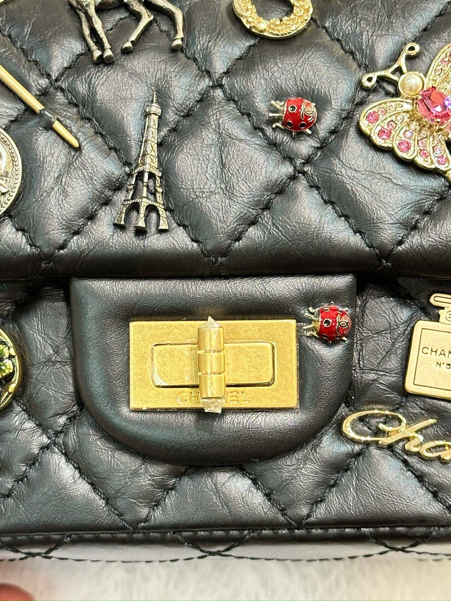 Chanel Black Quilted Aged Leather Lucky Charms Reissue 2.55 Classic 224 Flap Bag