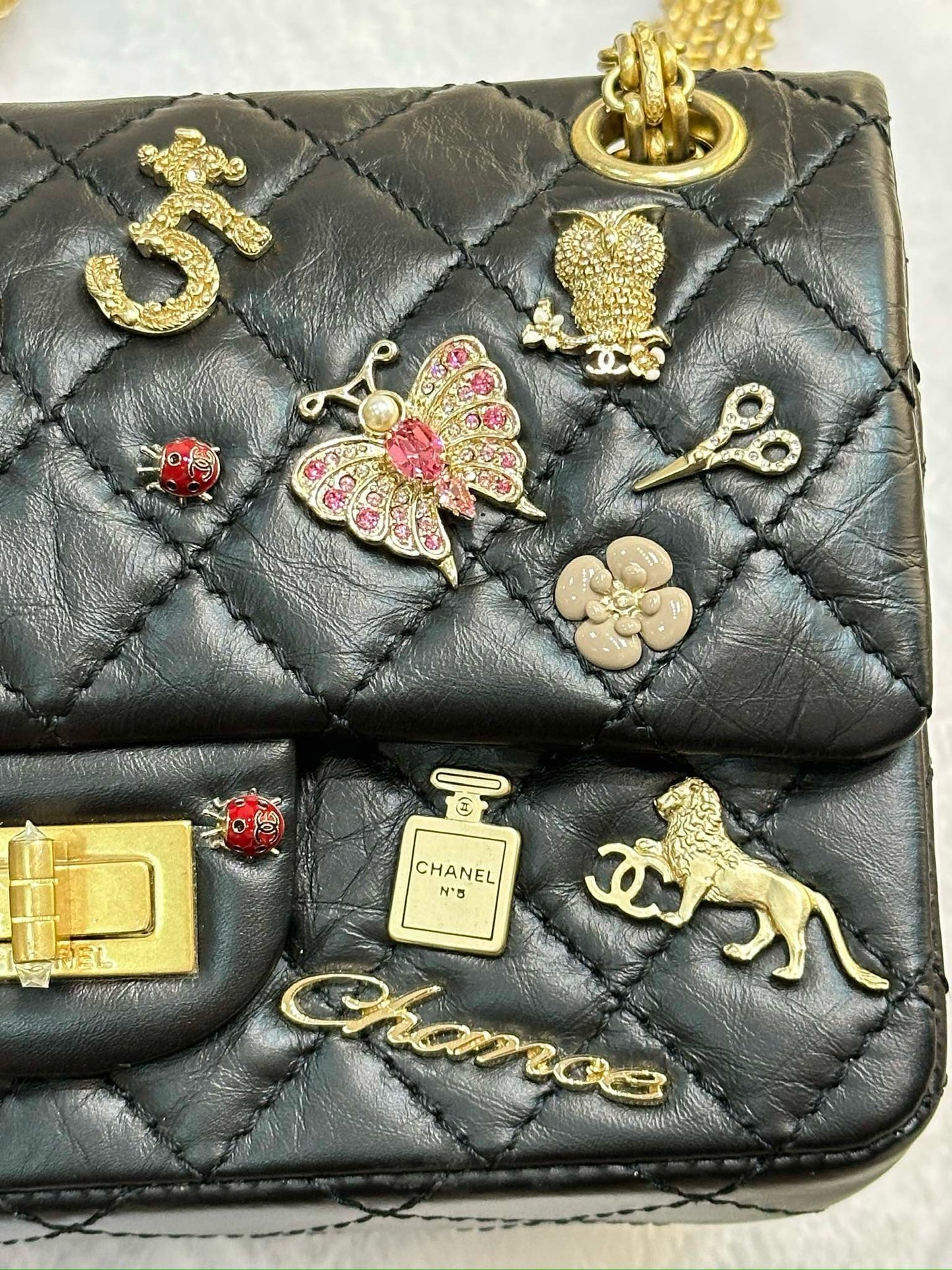 Chanel Black Quilted Aged Leather Lucky Charms Reissue 2.55 Classic 224 Flap Bag