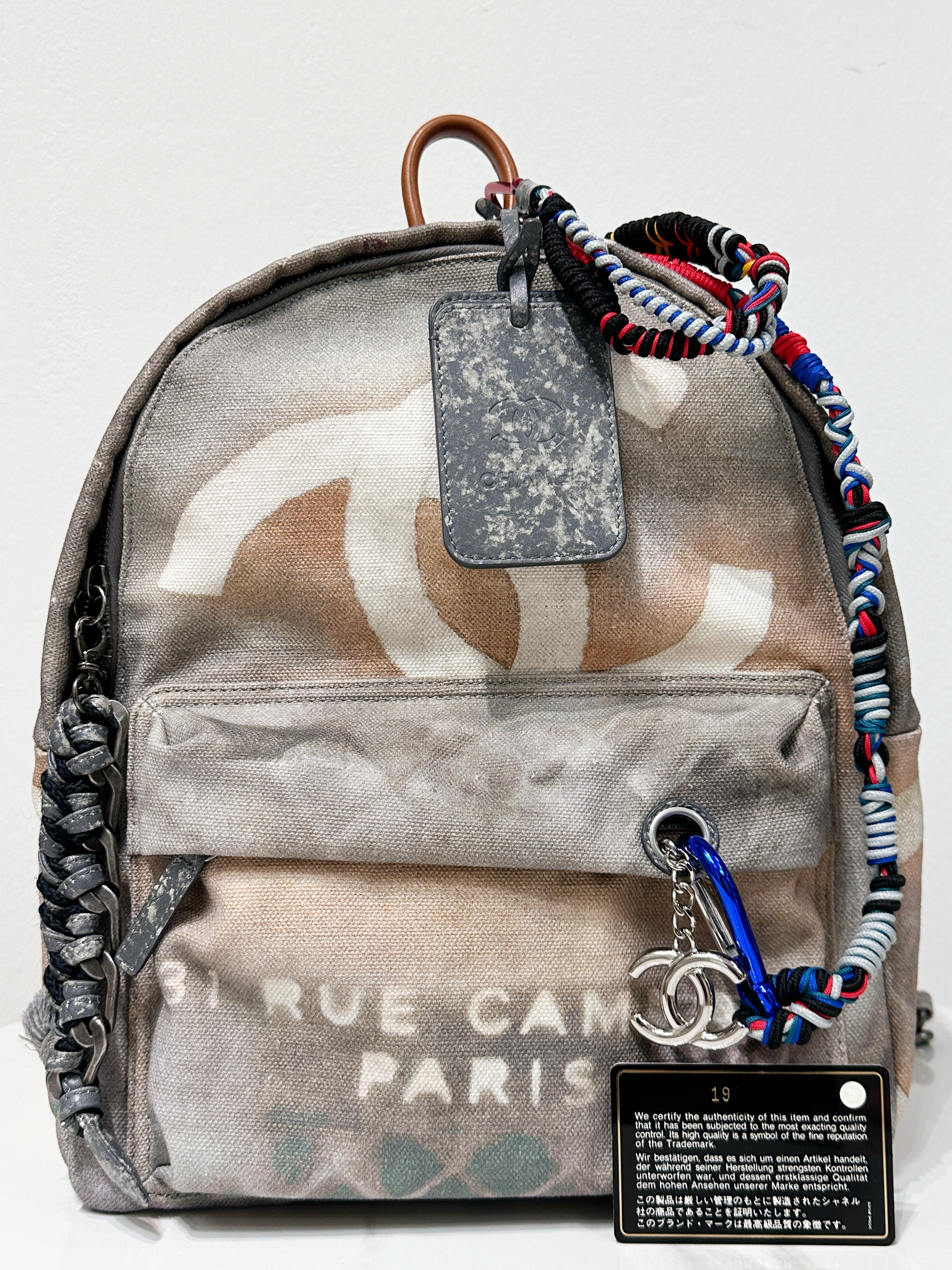 Preloved authentic Chanel Graffiti Printed Canvas Medium Backpack Grey