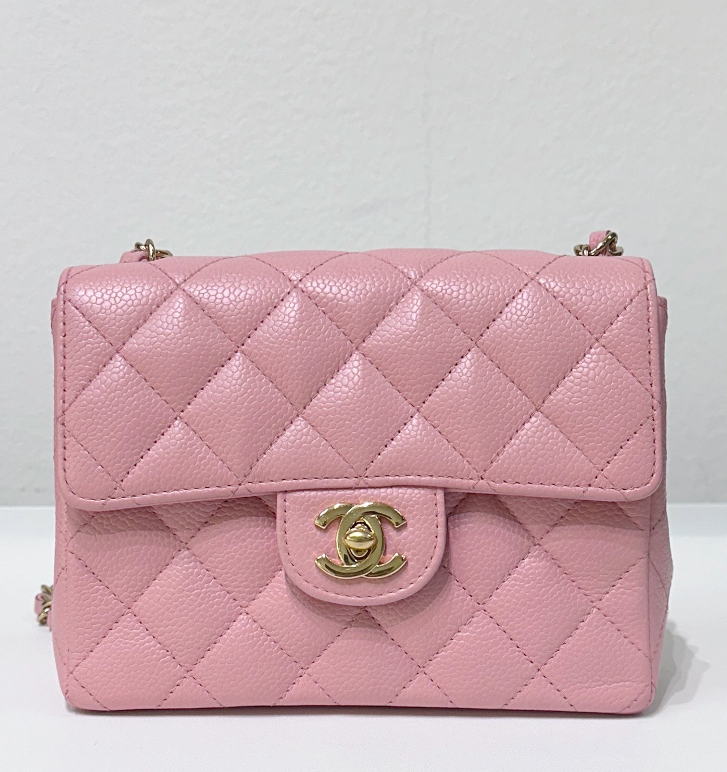 Chanel Mini Square Classic Caviar Flap Pink. Body lightly touched