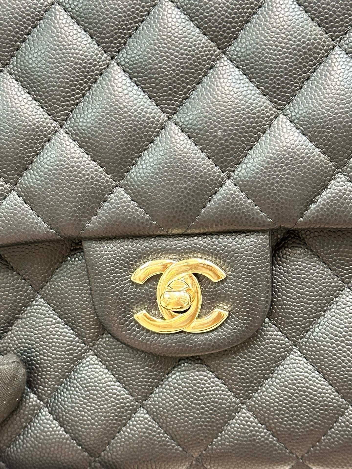 Chanel Quilted Caviar Classic Clutch Black GHW