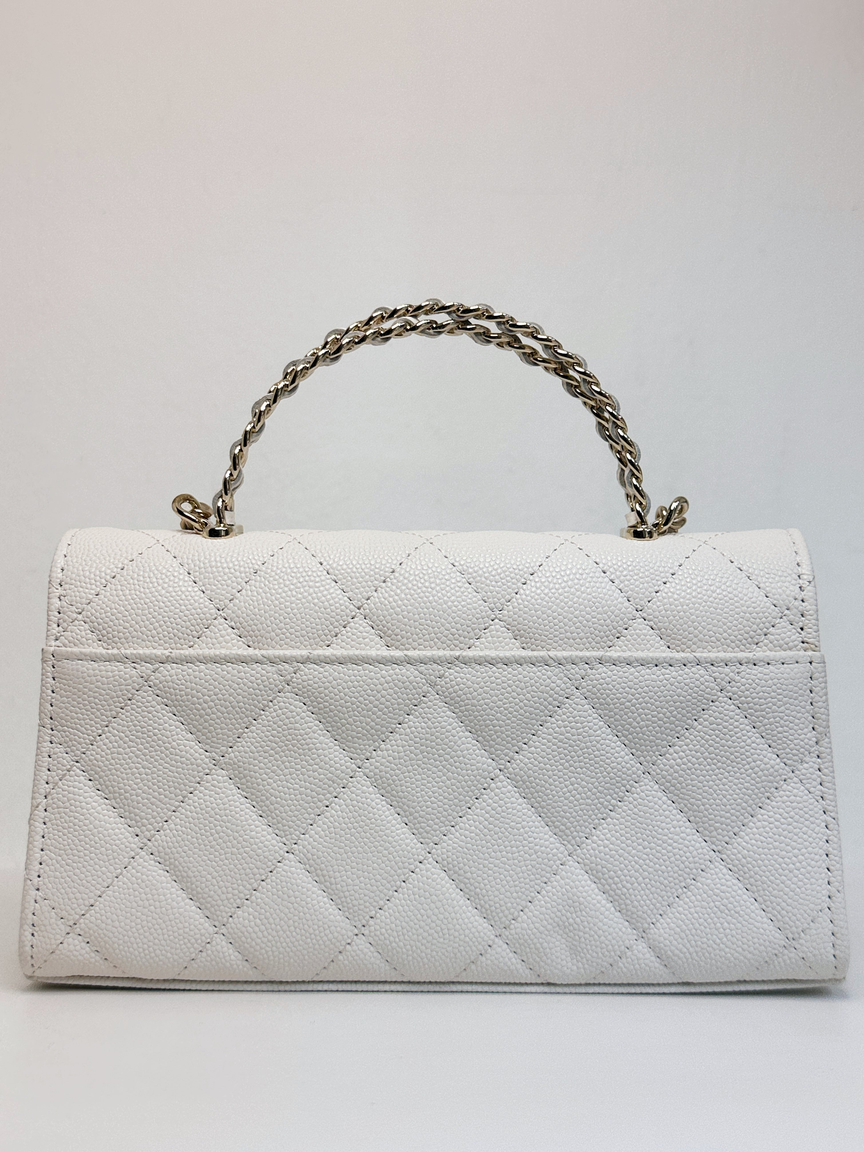 Chanel 23P Top Handle Kelly Clutch with Chain in White Caviar GHW