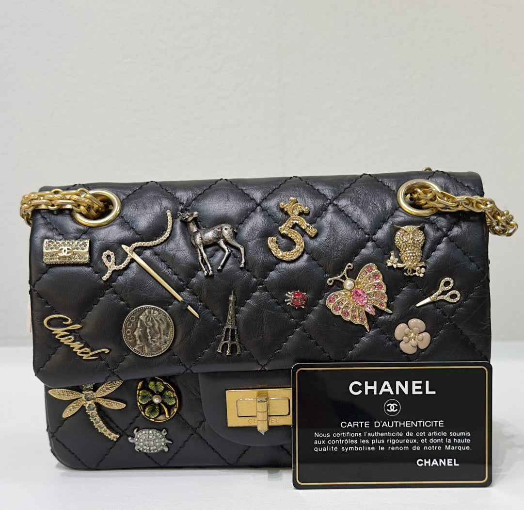 Chanel Black Quilted Aged Leather Lucky Charms Reissue 2.55 Classic 224 Flap Bag