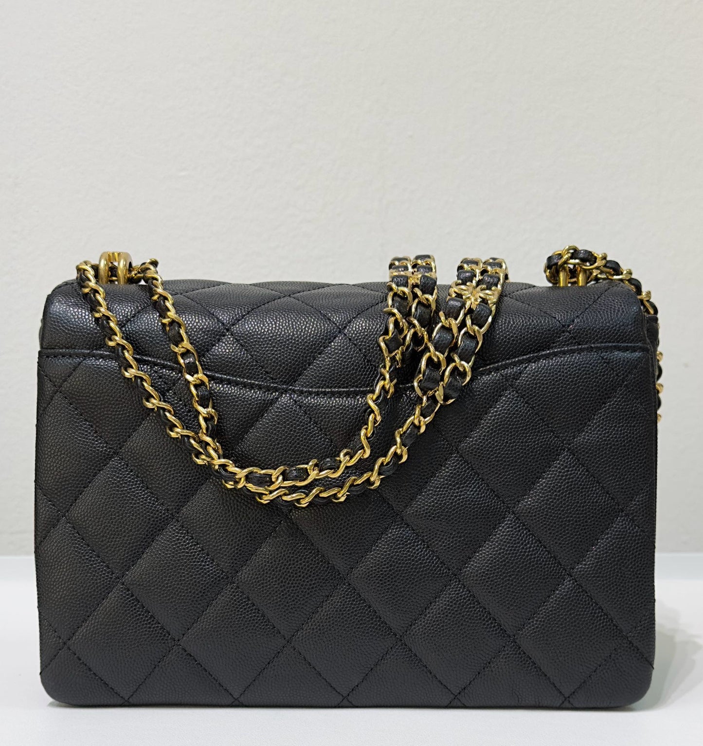 Chanel Caviar Quilted Coco First Flap Black 22K