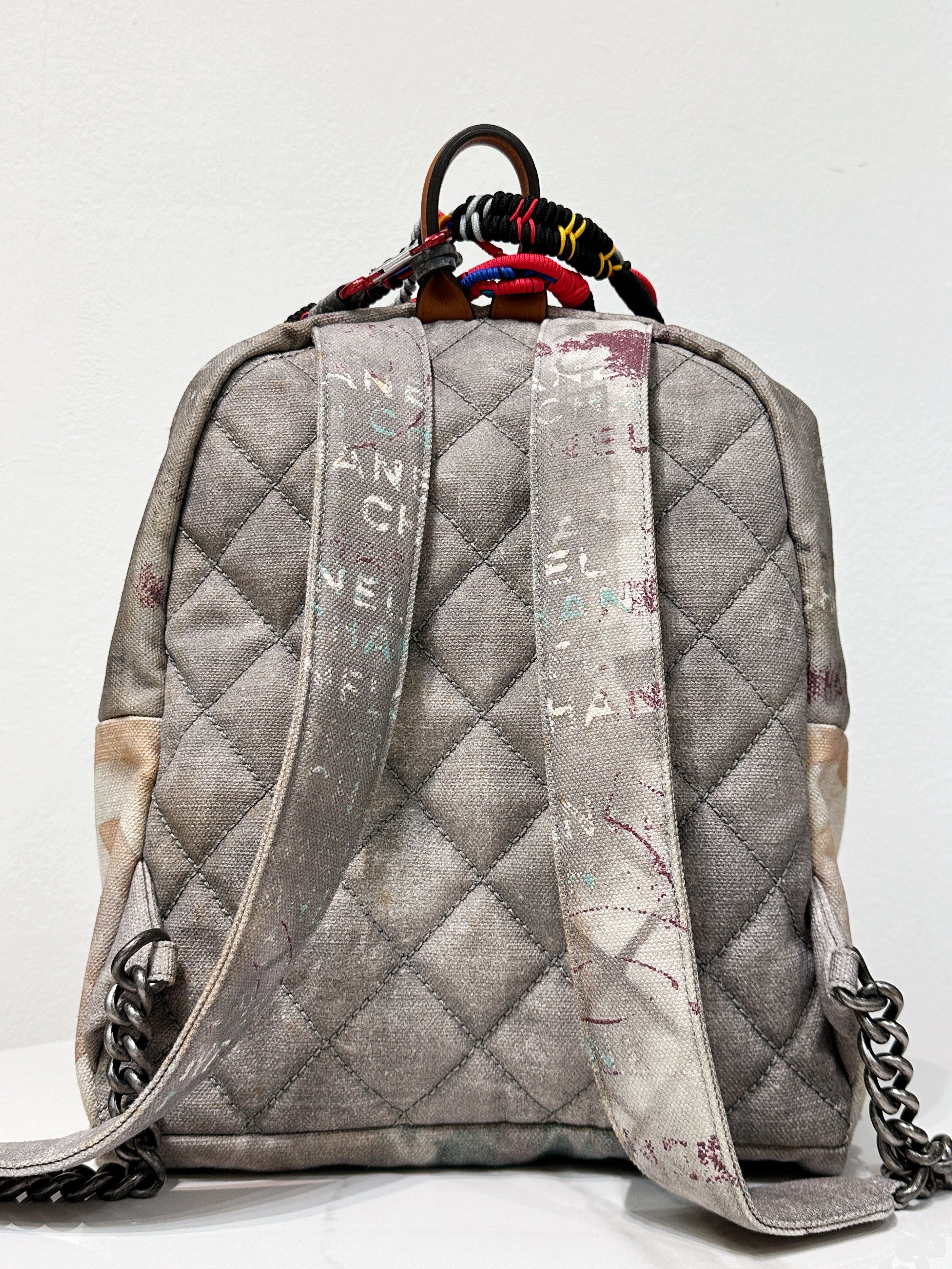 Preloved authentic Chanel Graffiti Printed Canvas Medium Backpack Grey