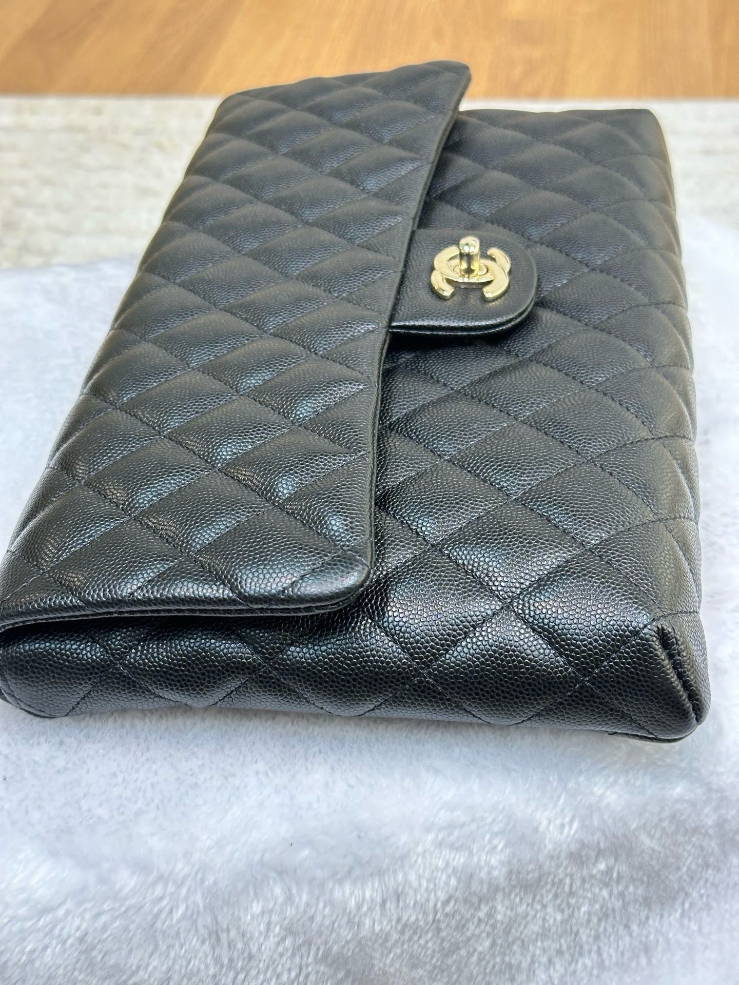 Chanel Quilted Caviar Classic Clutch Black GHW