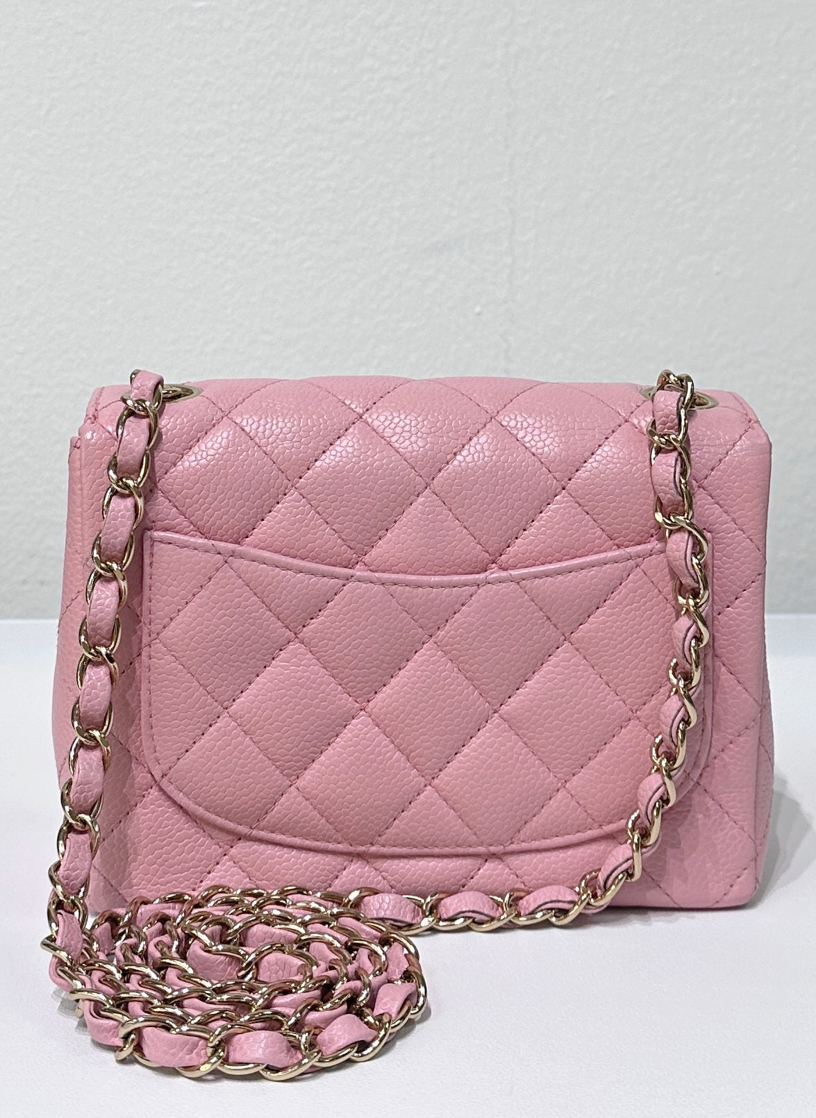 Chanel Mini Square Classic Caviar Flap Pink. Body lightly touched