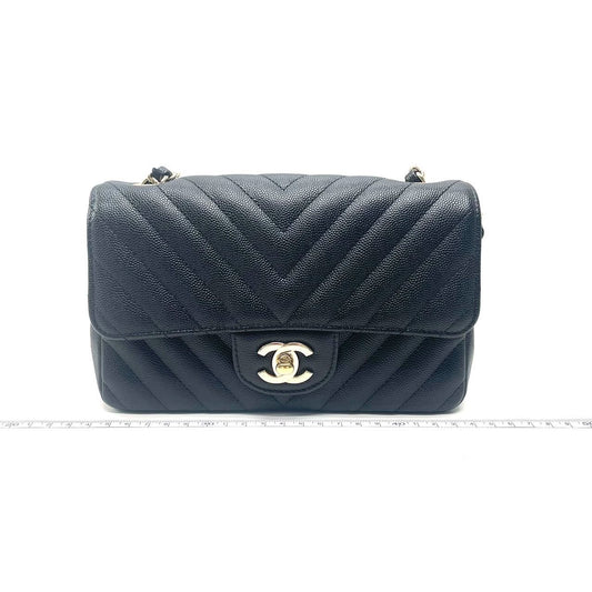 Chanel 18B Classic Mini Rectangular Black Chevron Caviar with light gold hardware