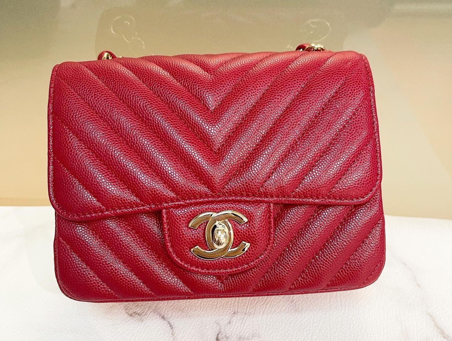 Chanel 18B Mini Square Raspberry Red Chanel Chevron Caviar with light gold hardware